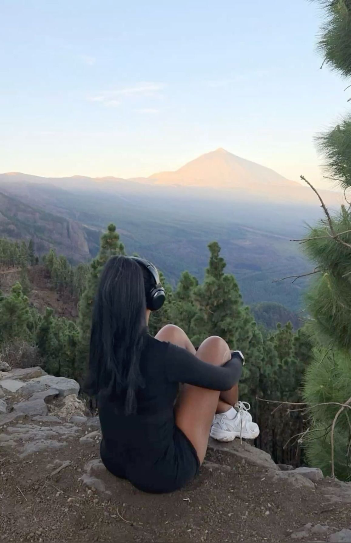 Girl on top of mountains